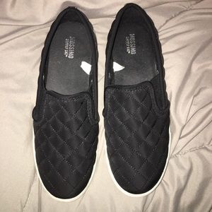 Black slip on sneakers